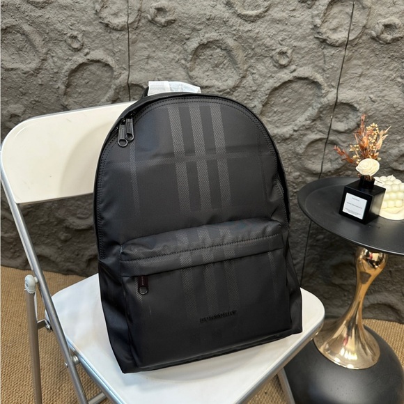 Burberry black slip leather notebook backpack